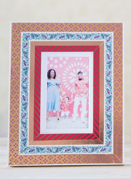 A picture frame with a decorative border