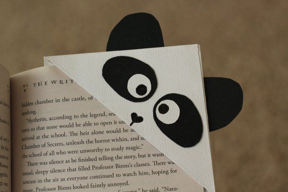 Image of a corner bookmark that looks like a panda.