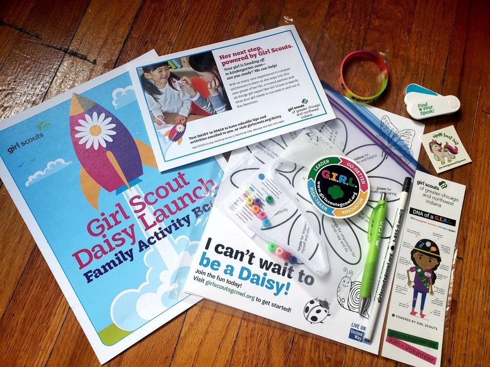 Contents of Girl Scout Goody Bag: brochures, friendship bracelet kit