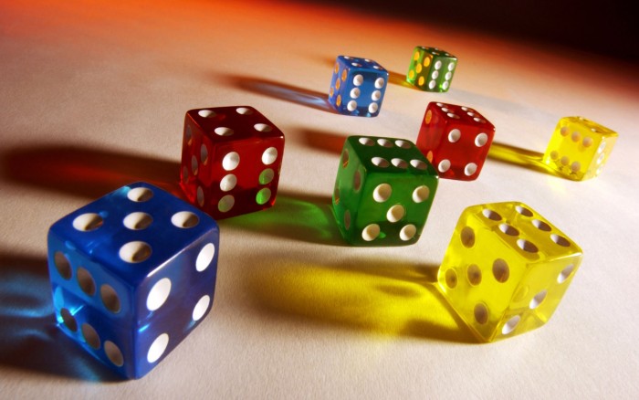 Various colorful six sided dice