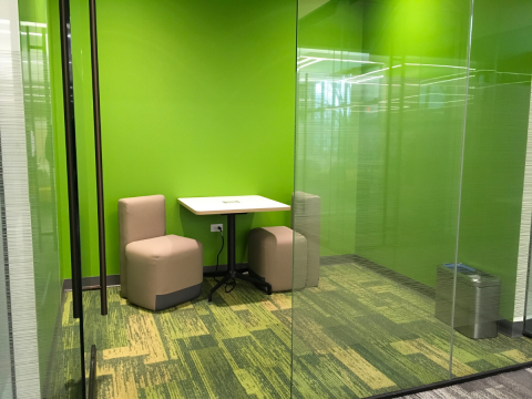study Room C with green walls, table, and two chairs