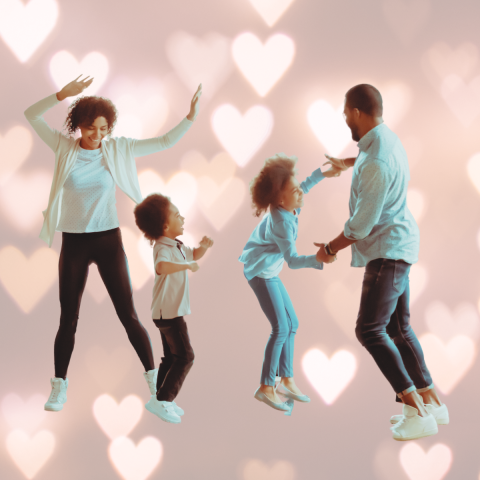 Black family of 4 dancing, hearts in background