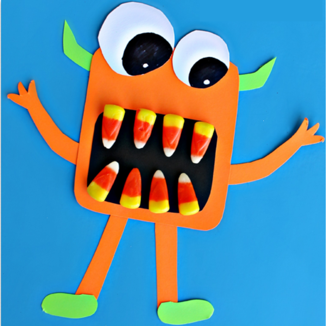 Picture of an orange monster with candy corn teeth